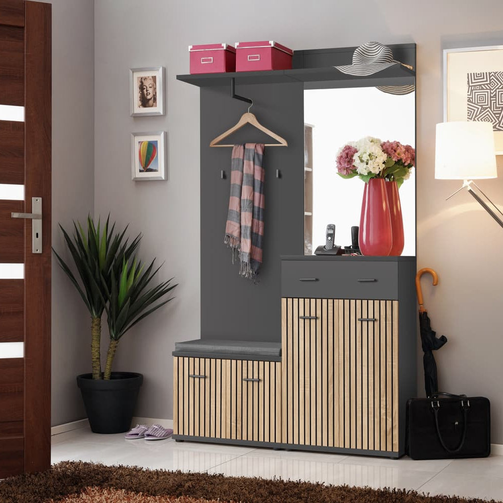 Modern entryway with a gray and wooden cabinet, mirror, and decorative items.