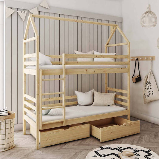Wooden house-shaped bunk bed in a room with decor elements.