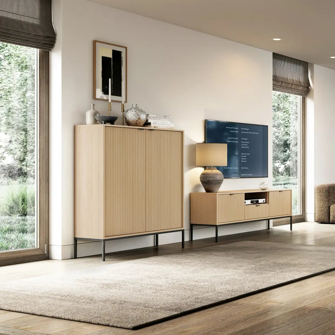 Modern living room with wooden furniture and a television.