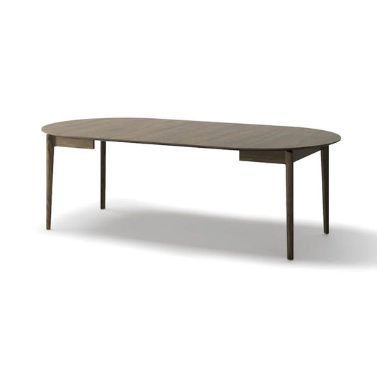 Wooden dining table on a white background