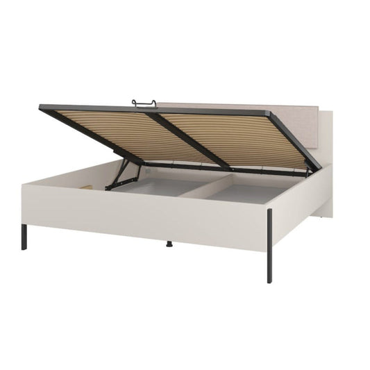 White bed frame with black metal headboard on a white background