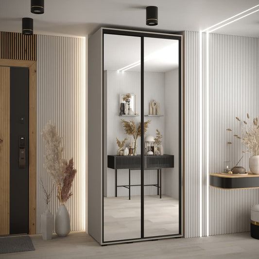 Modern wardrobe with mirror doors in a stylish room setting.