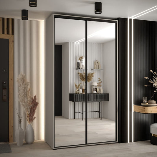 Modern interior design with a large mirror and decorative elements.