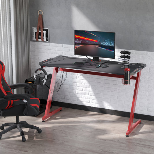 HOMCOM 142 x 66 cm Gaming Desk, Carbon Fibre Covered Computer Desk, Gamer Workstation with Headphone Hook, Cup Holder and Gamepad Storage Rack, Black and Red
