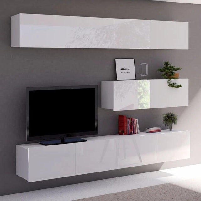 Modern living room setup with white wall-mounted cabinets, TV, and decor items.