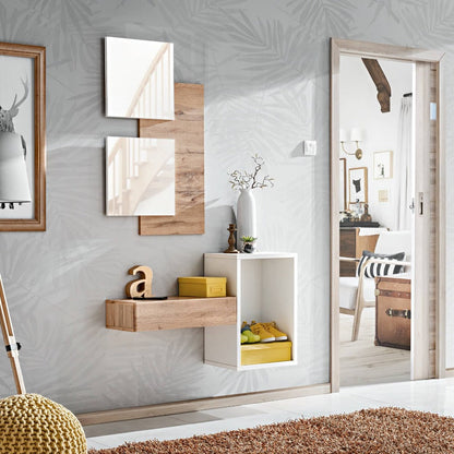 Modern interior design with wall art, shelves, and a large mirror.