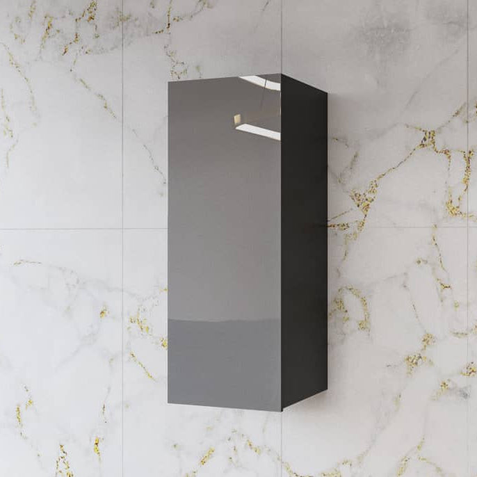 Black wall-mounted cabinet against a marble wall with gold accents