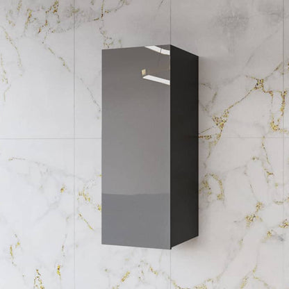 Black wall-mounted cabinet against a marble wall with gold accents