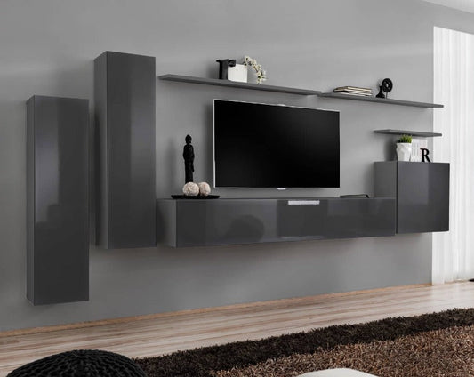Modern living room with gray wall unit, TV, and decor