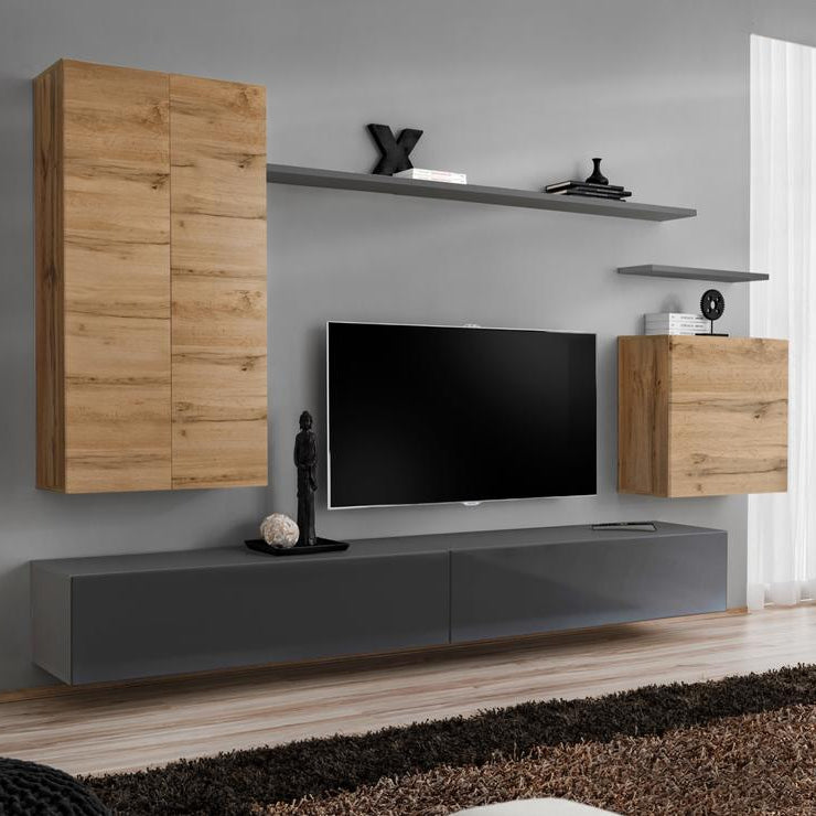 Modern living room with wooden cabinets, TV, and gray floor.