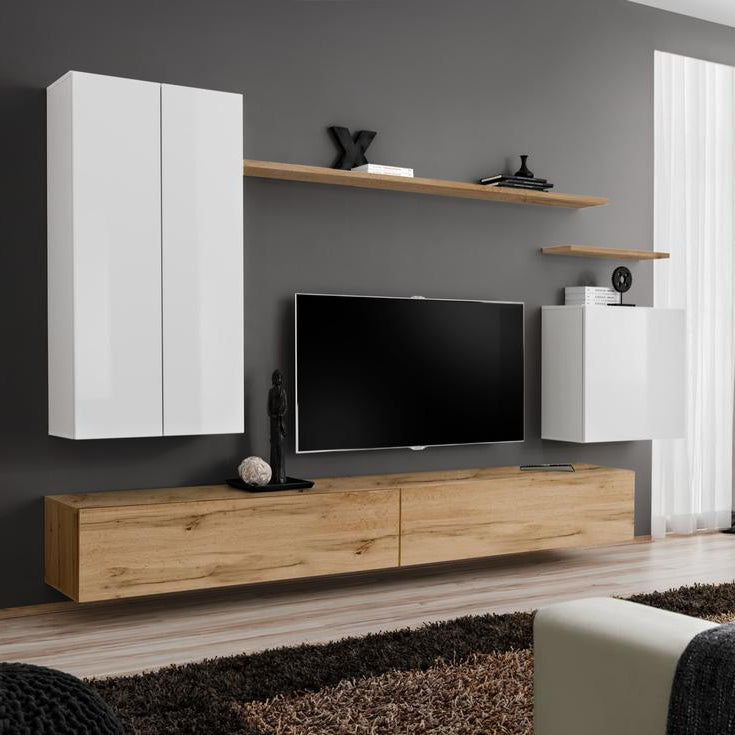Modern living room with wooden TV stand, white wall-mounted cabinets, and a sofa.