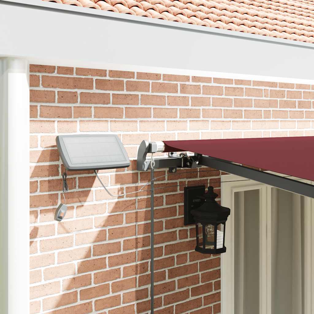 vidaXL Manual Retractable Awning with LEDs Burgundy 600x300 cm 4