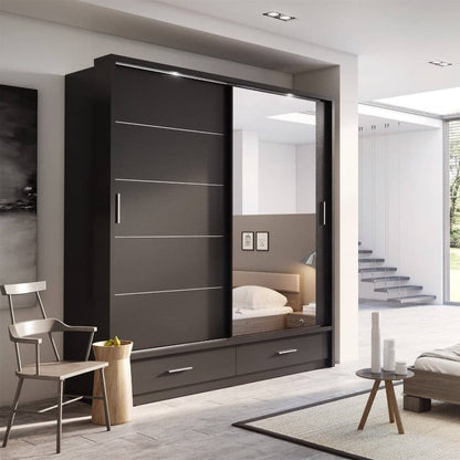 Modern bedroom with a large wardrobe and bed