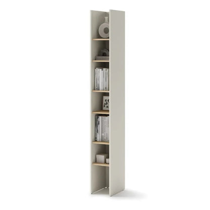 Tall narrow bookshelf with books and decorative items on a white background