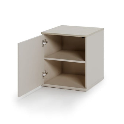 Small beige cabinet with a single door on a white background