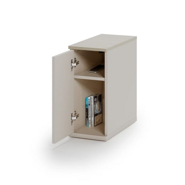 Small white cabinet with open door on a white background