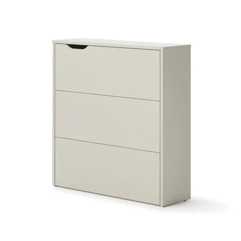 White shoe cabinet with three drawers on a white background