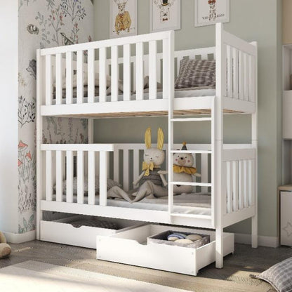 White children's bunk bed with storage drawers in a room setting.