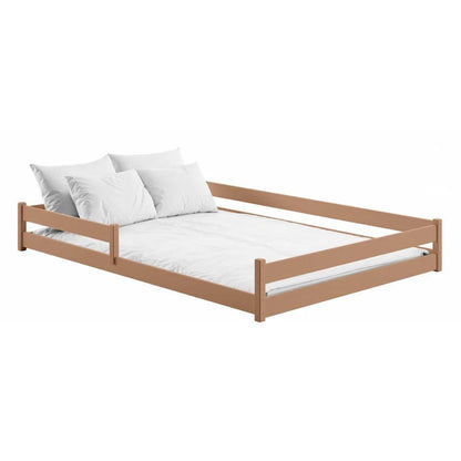 Wooden bed frame with white bedding on a white background