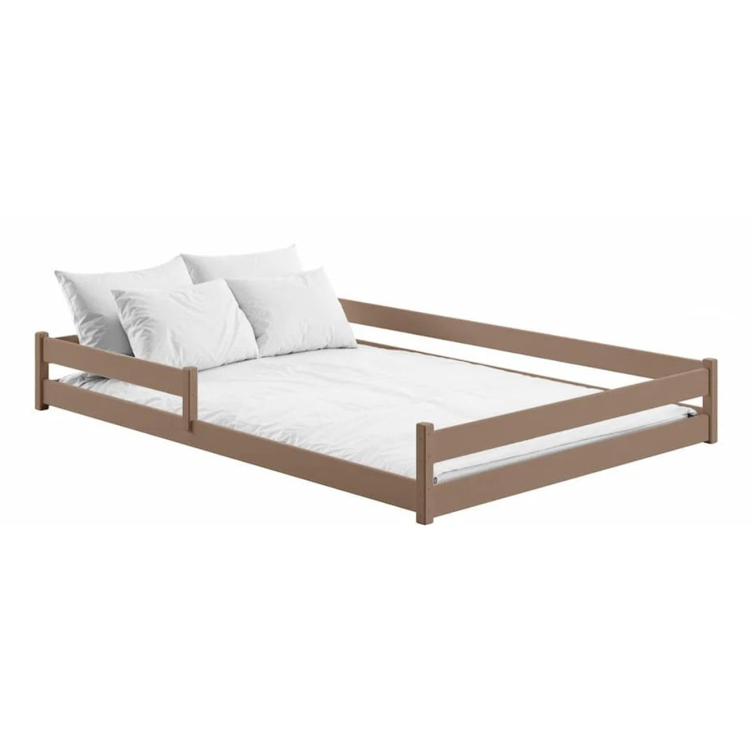 Wooden bed frame with white bedding on a white background
