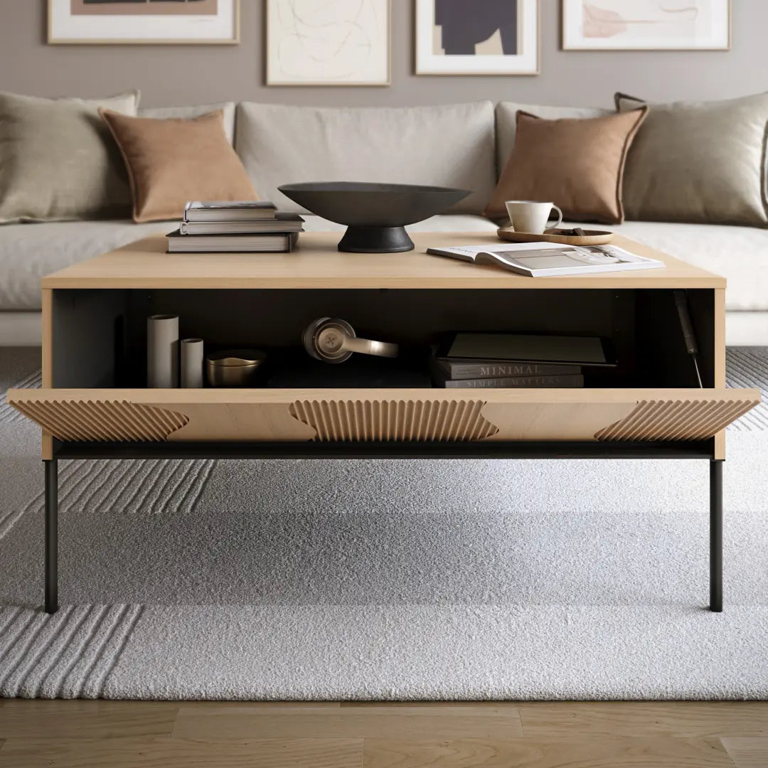 Modern coffee table in a living room setting with decor items on top