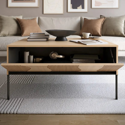Modern coffee table in a living room setting with decor items on top