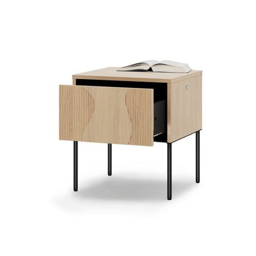 Wooden side table with a drawer on a white background