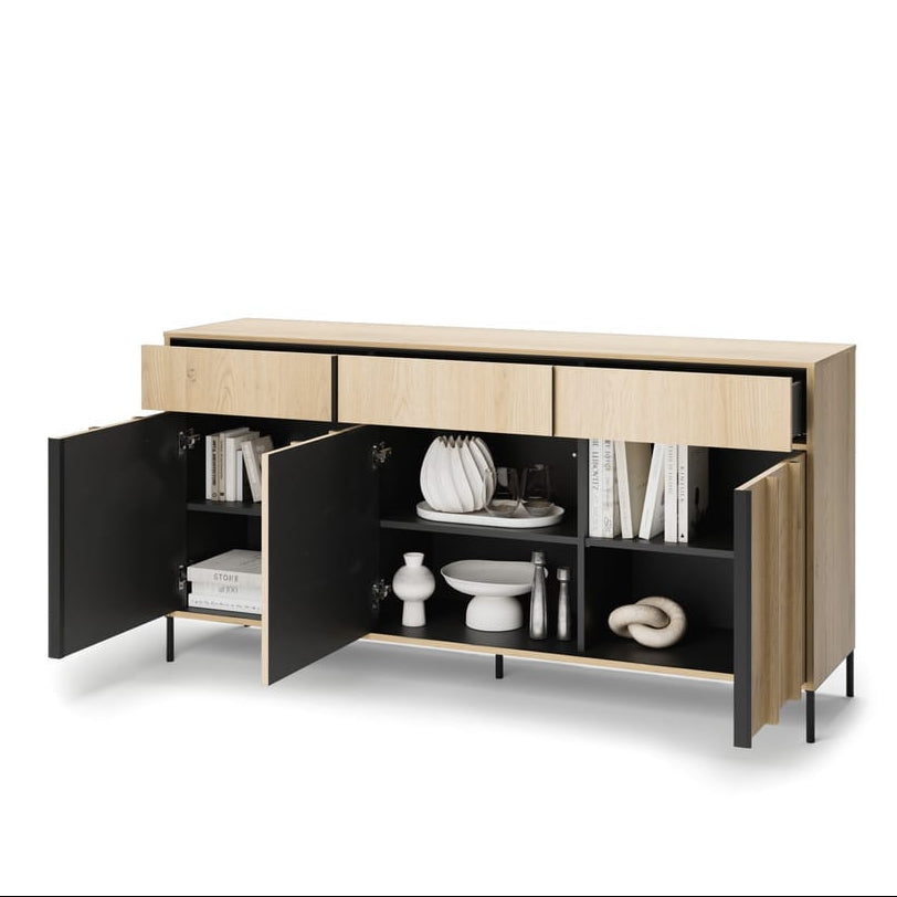 Modern sideboard with open doors displaying decorative items on a white background