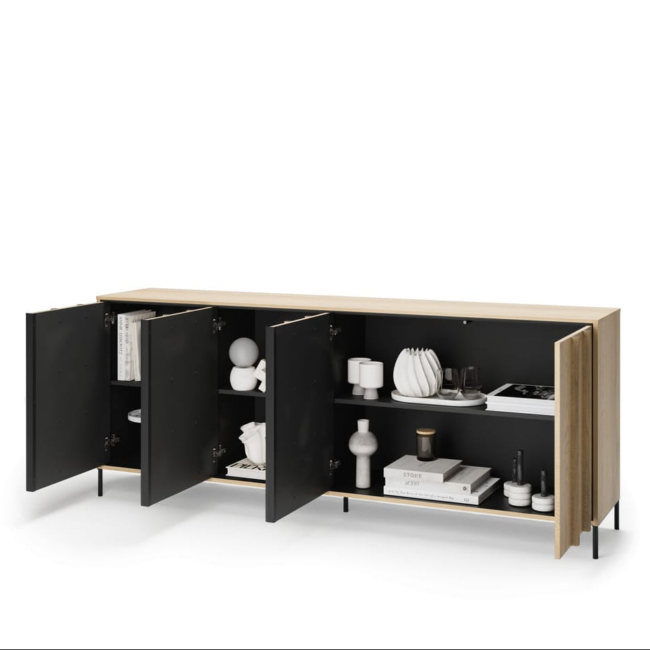 Modern sideboard with open doors displaying decorative items on a white background