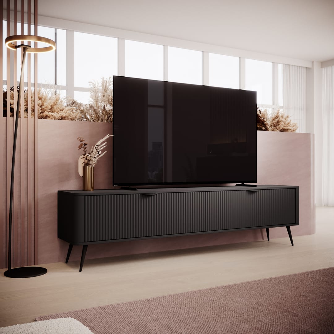 Modern living room with a black TV stand and television
