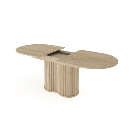 Wooden dining table with two extendable leaves on a white background