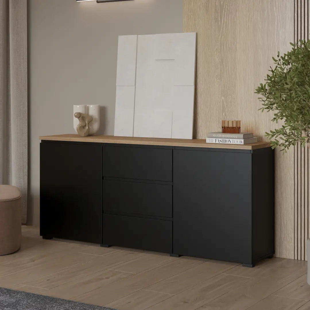 Black sideboard with wooden top in a room setting