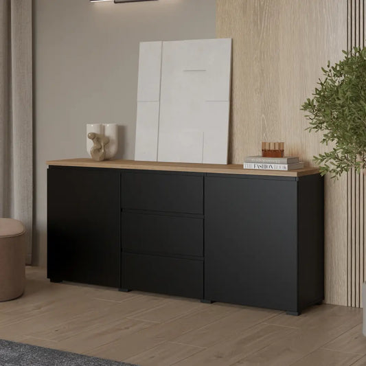 Black sideboard with wooden top in a room setting