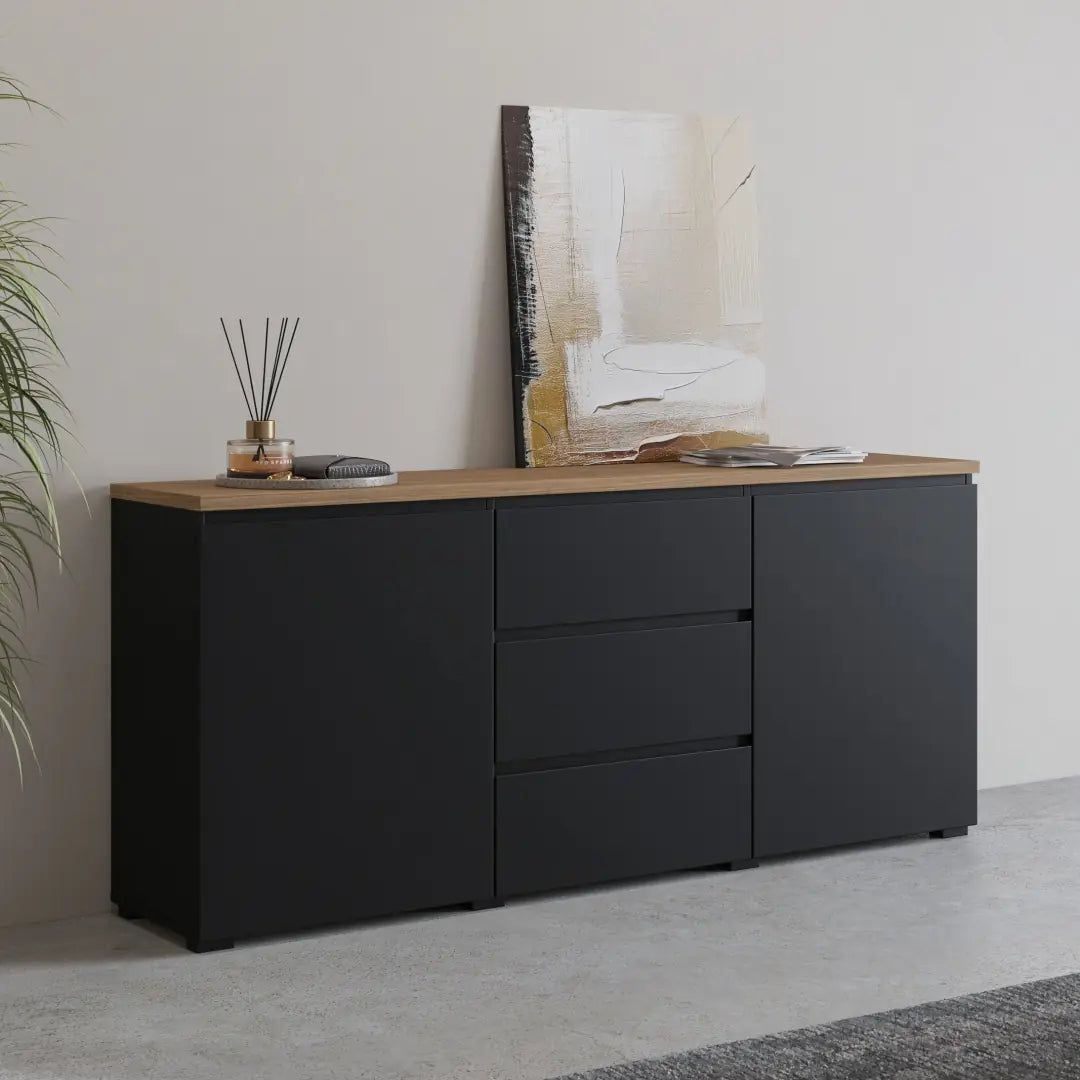 Black sideboard with wooden top in a room setting