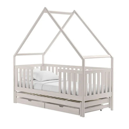 White children's house-shaped bed on a white background