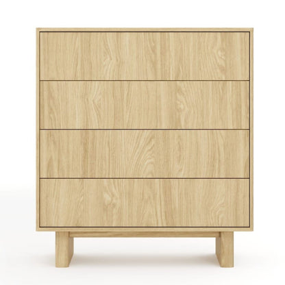 Wooden dresser with four drawers on a white background