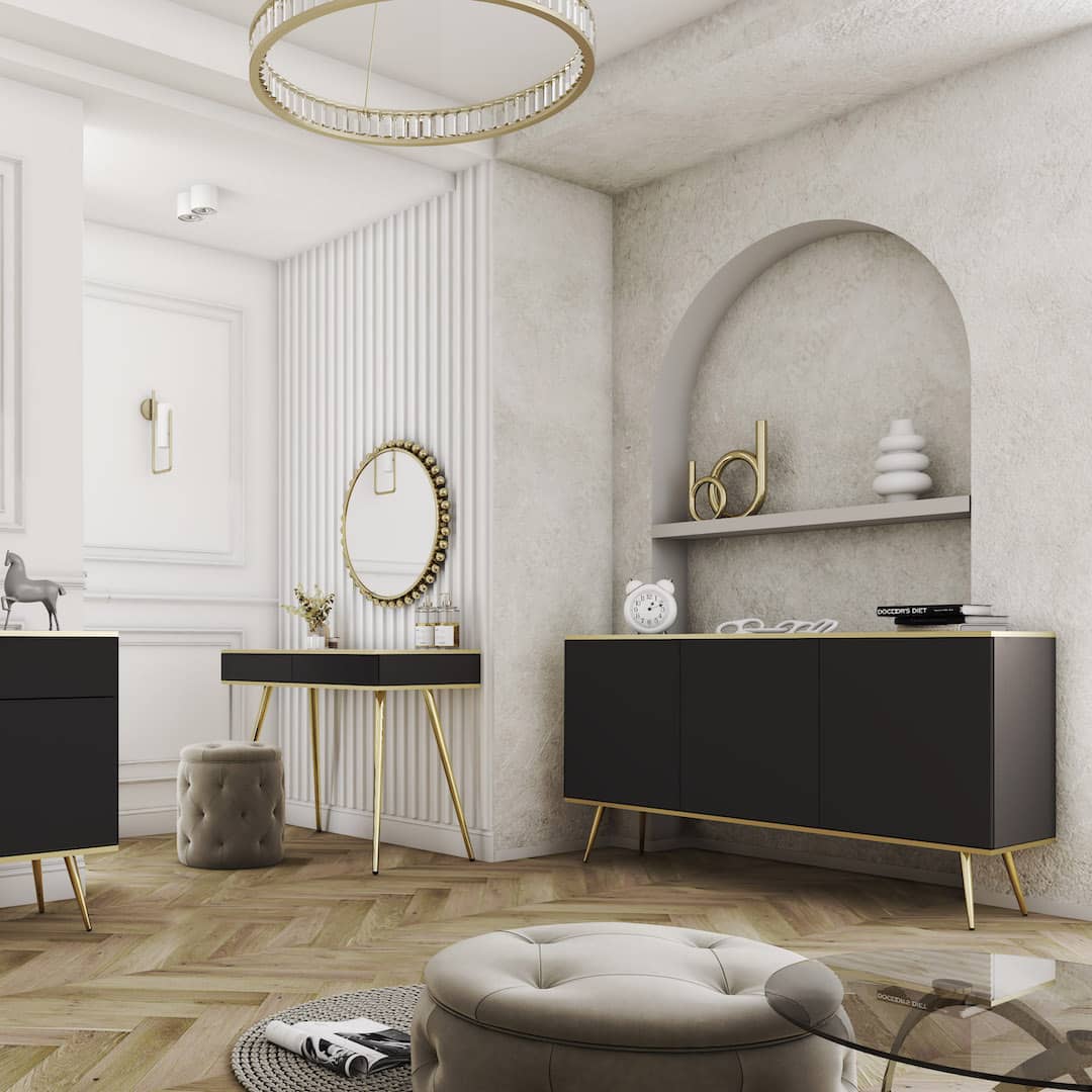 Modern interior design with black furniture, gold legs, and decorative elements.