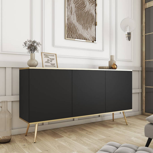 Modern black sideboard with gold legs in a stylish room setting.