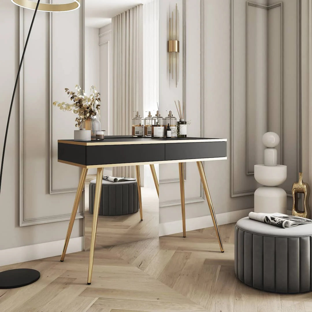 Modern vanity table with gold legs in a stylish room setting.