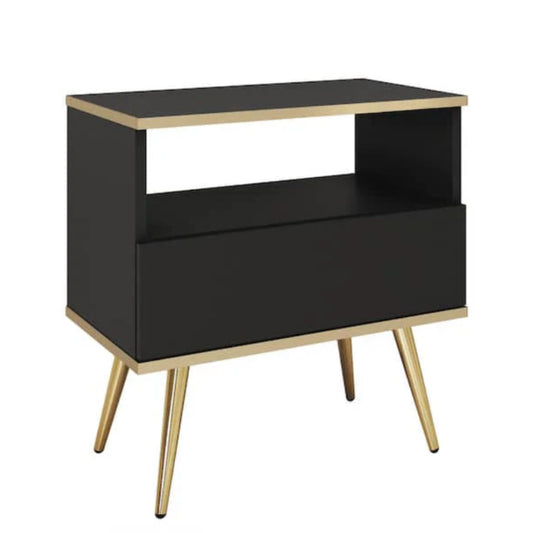 Black side table with gold legs on a white background