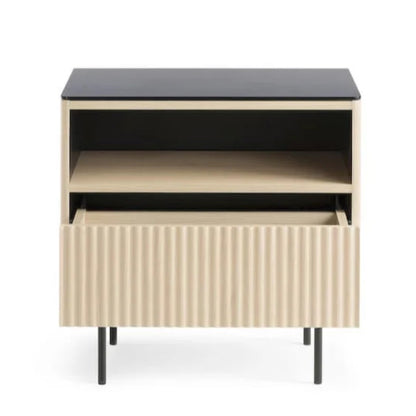 Small cabinet with black top and beige body on a white background