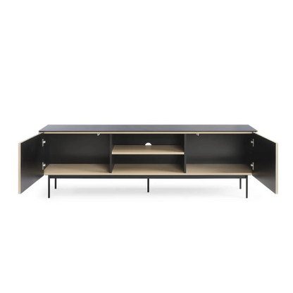 Modern entertainment console with black top and wooden sides on a white background