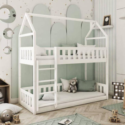 White children's bunk bed in a room with green walls and decorative elements.
