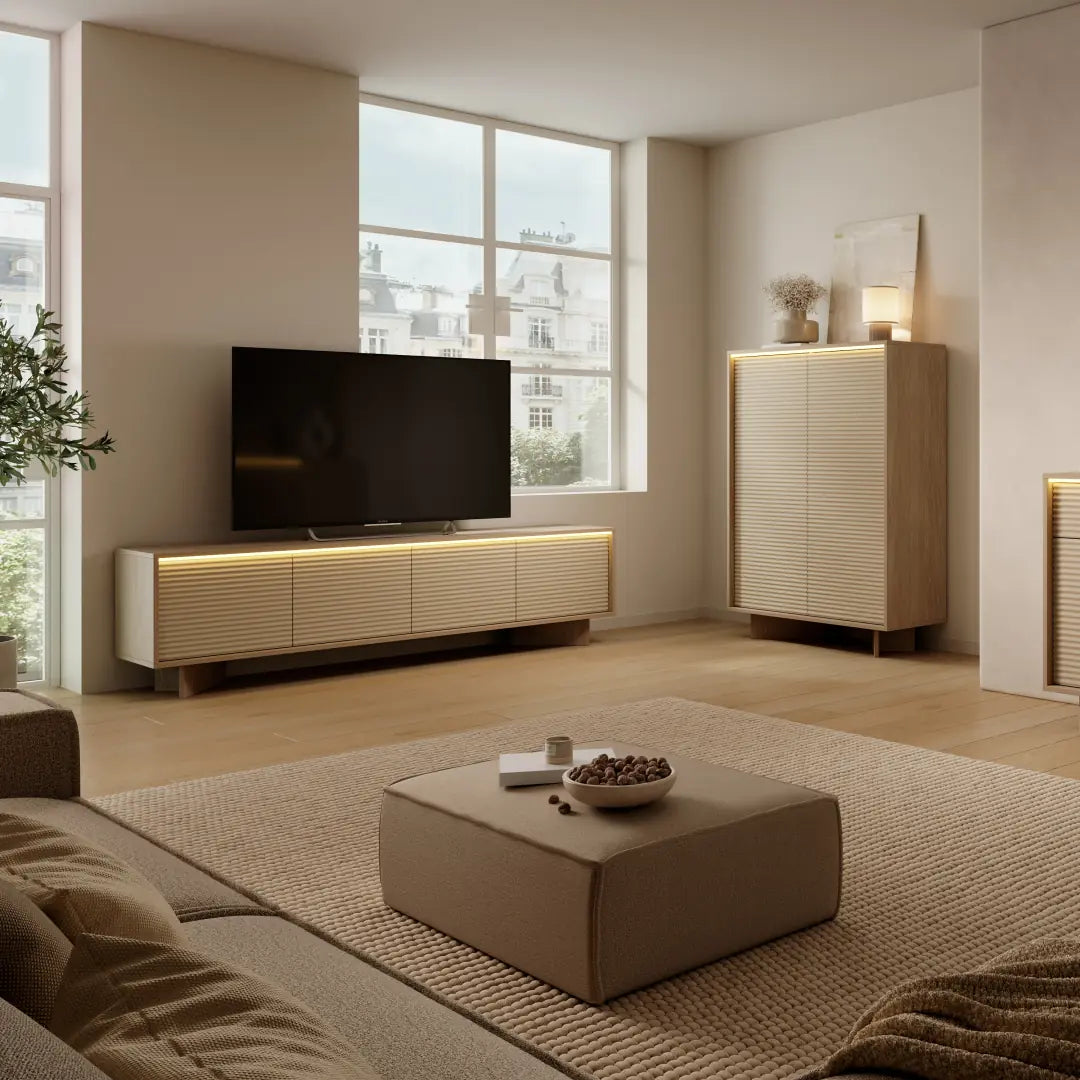 Modern living room with a TV stand, sofa, and coffee table.