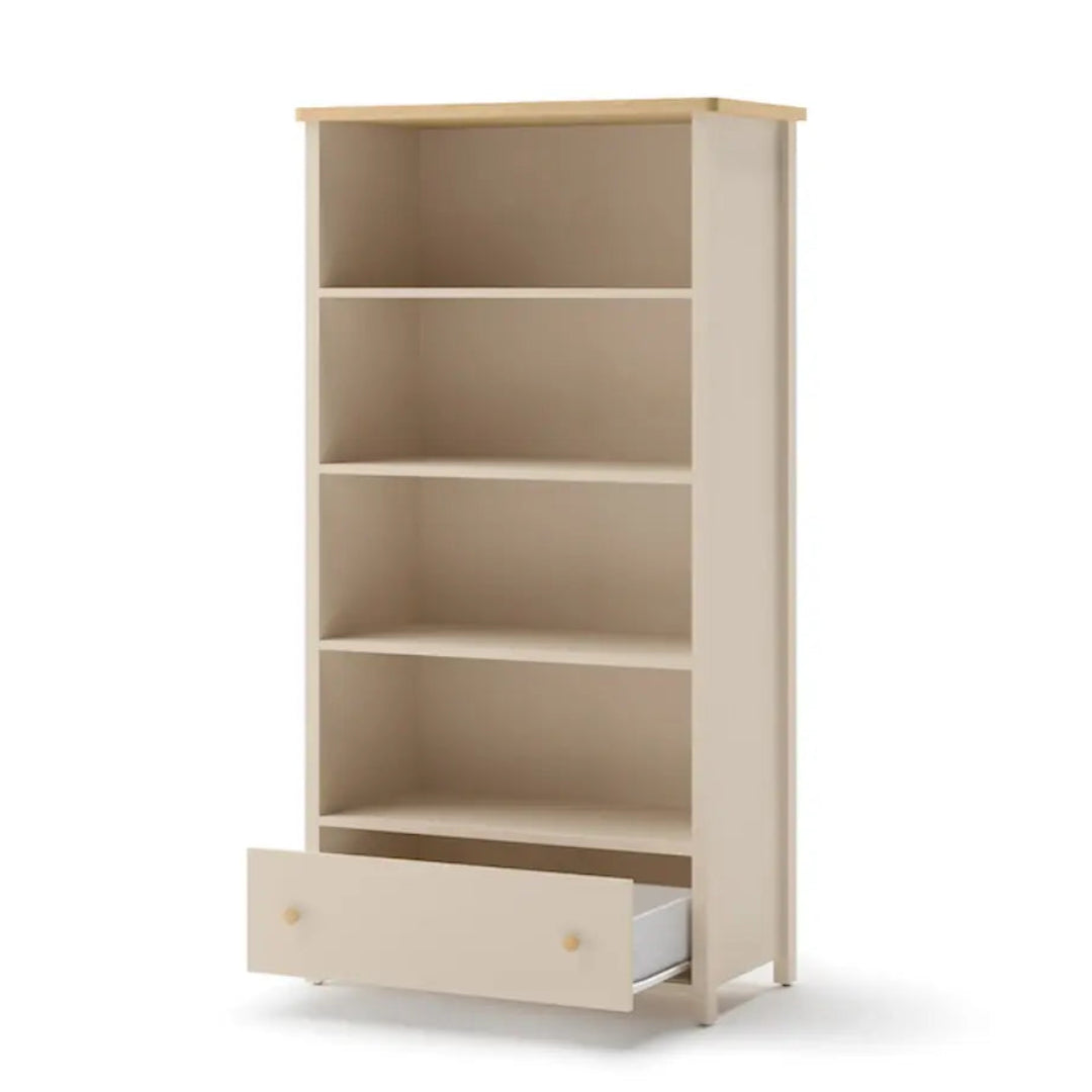 Beige bookshelf with a drawer on a white background