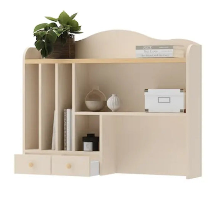 Beige bookshelf with decorative items on a white background