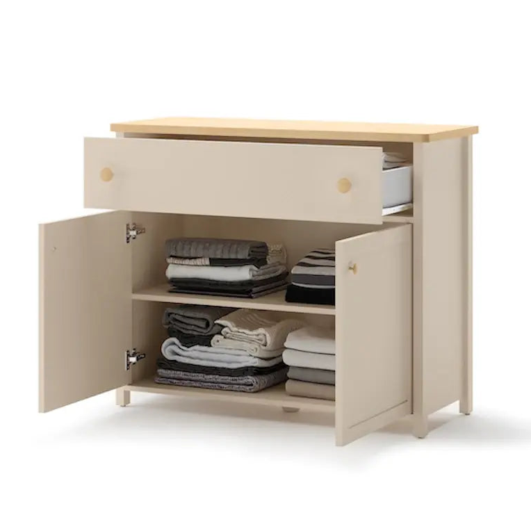 Beige sideboard with open doors displaying folded clothes on a white background