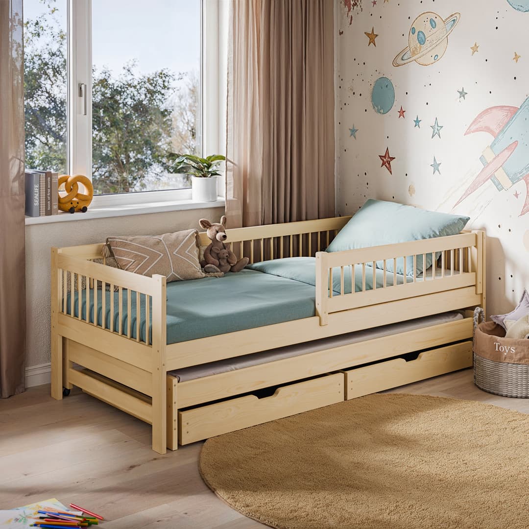 Children's bedroom with a wooden bed, teddy bear, and space-themed wallpaper.