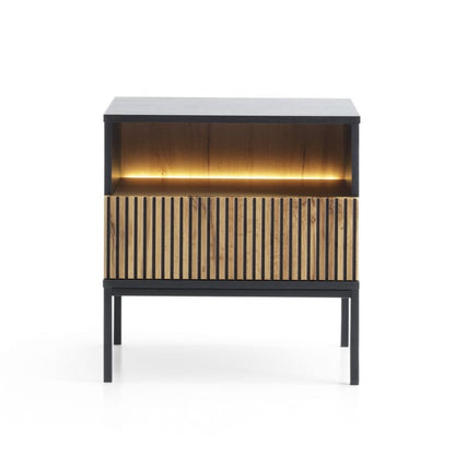 Modern side table with wooden slatted design on a white background