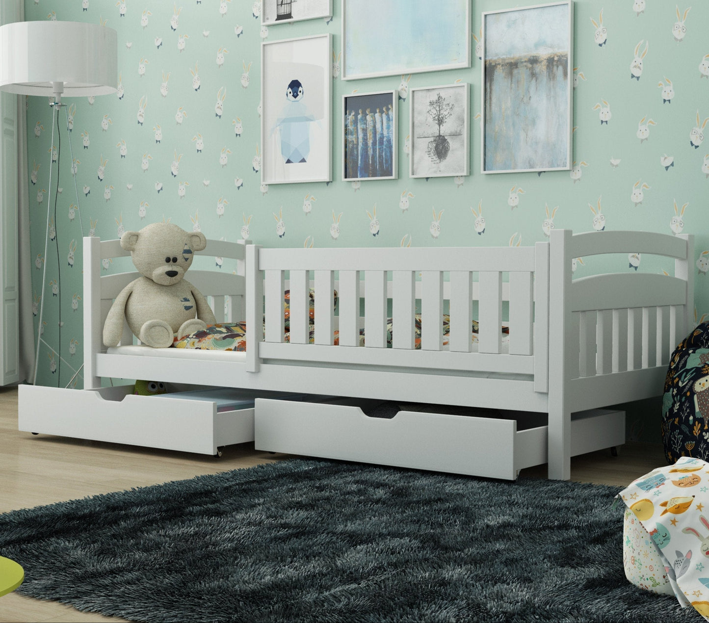 Children's room with a white crib, teddy bear, and decorative elements.